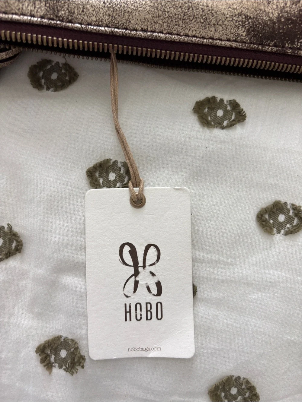 NWT HOBO Metallic Bronze and Dark Brown Wristlet Clutch with Tassel